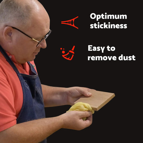 Person cleaning wood with Pro Grade Paint Prep Tack Cloth Kit for Woodworking and Auto Painting, Sticky Anti Static Dust Rags.