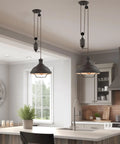 Sequoia 13 Inch Dope Industrial Pulley Pendant Light With Dome Shade And Counterweight In Oil Rubbed Bronze Finish over kitchen island