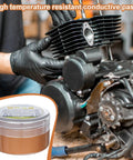 Copper Conductive Grease For Electrical Contacts And Automotive Systems With Extreme Temperature Resistance shown near engine