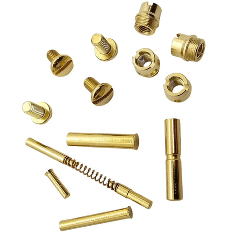 Straight Up Quality Polished Gold Plated 1911 Grip Screws Pins And Bushings Set with various screws and pins shown.