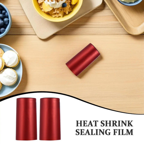 Top Shelf Heat Shrink Wine Caps For Flawless Bottle Sealing Easy Peel Cork Covers on a wooden table.