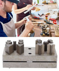 Jeweler using Pro Grade Jewelry Punch Die Disc Cutter Set with assorted steel shapes and sizes for crafting and DIY projects.