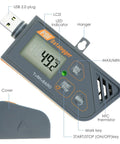 USB Temperature And Humidity Data Logger With Barometric Pressure Tracking, LCD display, USB plug, and indicator showing 49.2% RH.
