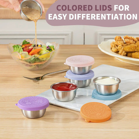 Eight Pack 1.6 Oz Portable Salad Dressing Containers With Lids Leakproof Reusable Stainless Steel Sauce Cups on counter
