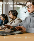 Customer service team providing after-sales support via phone and laptop in an office environment.
