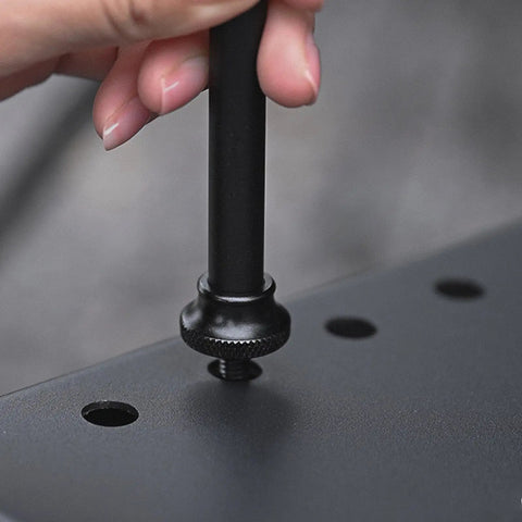 Close-up of adjusting screw on Collapsible Lantern Stand For Camping And Backyard, Portable Adjustable Light Pole With Aluminum Hook And Ground Stakes