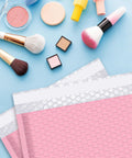 8x10 Light Pink Bubble Mailers Padded Envelopes Self Sealing Shipping Bags 25 Pack, Water And Tear Resistant, next to makeup items