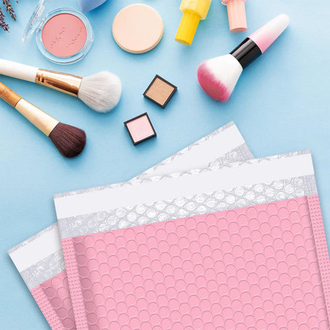 8x10 Light Pink Bubble Mailers Padded Envelopes Self Sealing Shipping Bags 25 Pack, Water And Tear Resistant, next to makeup items