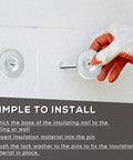 1.5-inch perforated insulation pin with galvanized self-locking washer for wall or ceiling; gloved hand installing.
