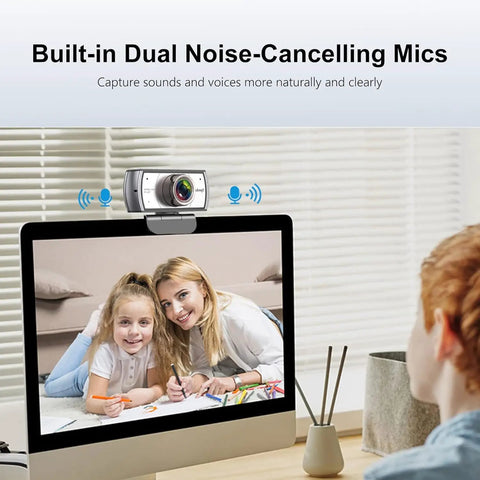Sweet 120 Degree Wide Angle Webcam Loaded With Punchy Noise Canceling Mic For Zero Glitch Boardroom Meetings And Totally Hassle Free Telecommuting Video Calls On Any Desktop placed above a computer screen with dual microphones visible.