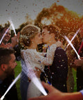 Wedding couple kissing surrounded by guests holding white fiber optic wands glow sticks light up LED sparklers for weddings and parties