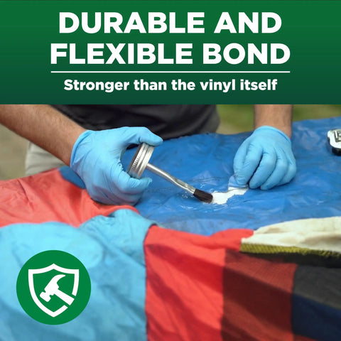Applying industrial grade heavy duty vinyl adhesive for PVC and vinyl repairs that bonds under water stays flexible after cure.