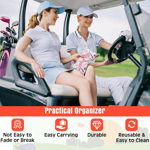Two people sitting in a golf cart holding a Golf Makeup Bag Set 24 Pieces Bulk Canvas Cosmetic Pouches Zip Bags 7 x 4 Inches