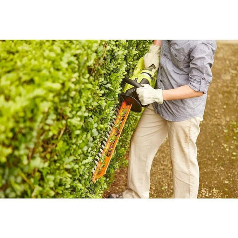Person using 22 Inch Cordless Hedge Trimmer With 18 Volt Power Delivers Beast Mode Performance In A Lightweight Easy To Maneuver Package For Home Yards And Precise Hedge Pruning on hedge.