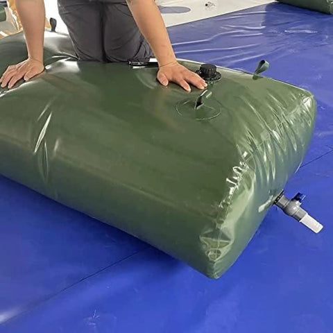 Person demonstrating Foldable Water Storage Bladder With Faucet 110L Portable Camp Ready Collapsible Water Tank