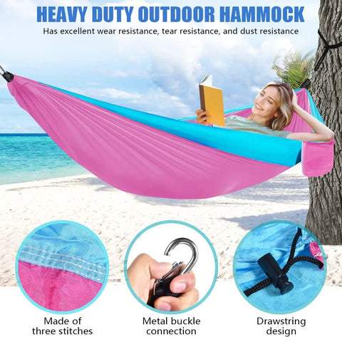 Camping Hammock For All Adventures Heavy Duty Nylon 500 Pound Capacity Portable Lightweight Single Or Double With Tree Straps And Carry Bag Ideal For Camping Backpacking Hiking Travel Beach Outdoor Indoor Blue And Pink. Woman relaxing on pink and blue hammock at beach.