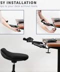 Two Pack Clamp Adjustable Armrests Transform Your Home Office Into A Hella Comfy Haven With Flexible 360 Rotating Elbow Support And Sturdy Steel Base Stand For Epic Desk Setups In Classic Black during installation on a desk.