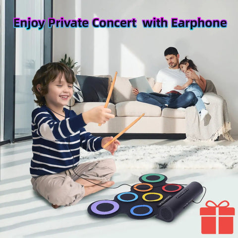 Child playing Roll Up Electronic Drum Pad Kit with 7 Pads, MIDI Output, headphones on, family in background on couch.