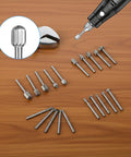 Top Shelf Wood Carving Bits Set For Slick Engraving Router Work Built With Hss Steel And One Eighth Inch Shank A Knockout Twenty Piece Drill Kit For Dang Easy Diy Woodworking Crafts Projects laid out on a wooden surface.
