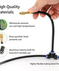 Hand holding flexible tubing of 100 Ft One Quarter Inch Drip Irrigation System Kit With 16 Adjustable Copper Nozzles, Easy Install, Automatic Misting For Raised Beds, Greenhouse, Lawn, Patio And Yard, Quick Connect Adapters, Stakes And All Essential Accessories