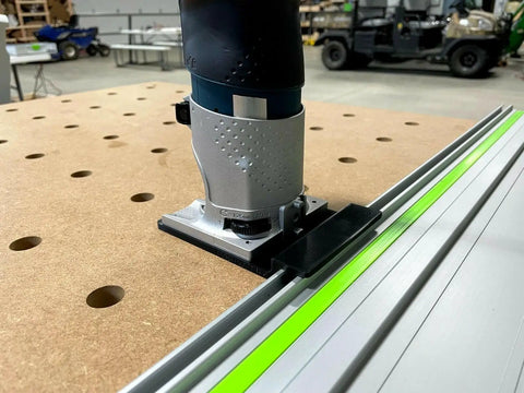 Guide Rail Adapter Compatible With Bosch Colt 1Hp Router For Track Saw Systems on a workbench, showing precision alignment and setup.