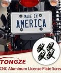 Top Shelf M6 License Plate Screws 12 Piece Kit Slick Black CNC Machined Aluminum Alloy Car Truck Motorcycle mounted on bike.