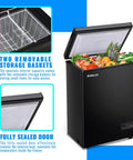 Freestanding Black Mini Chest Freezer With Precision Electronic Thermostat And Two Removable Baskets filled with food.
