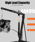 Heavy Duty Folding Hydraulic Engine Hoist With Six Swivel Casters For Serious Shop Projects And Easy Car Fixes Crafted From Corrosion Proof Steel That Glides Like Butter On Any Garage Floor with engine and hydraulic cylinder.