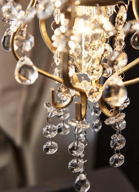 Close-up of gold crystal pendant chandelier plug in with inline on off switch, 180 inch cord, no assembly required, mini crystals