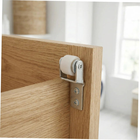 Close-up of Smooth As Butter Sliding Door Roller Track Guide Wheels 6 Pack, nylon wheel attached to wooden door.