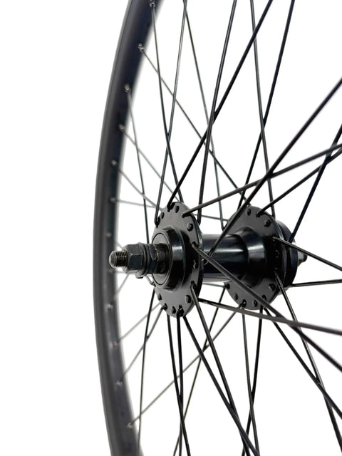 Close-up of EBike Front Wheel 26 Inch 36H Double Wall Aluminum Rim 100mm Bolt On Hub 13G Spokes Disc Brake Compatible