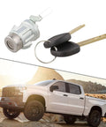 Chevy Colorado Manual Tailgate Lock Kit 23371760 with keys next to a white pickup truck in rocky terrain