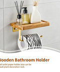 Straight Up Solid Wooden Bathroom Cell Phone Holder With Wall Mount Toilet Paper Stand And Premium Tissue Roll Dispenser on a wall shelf.