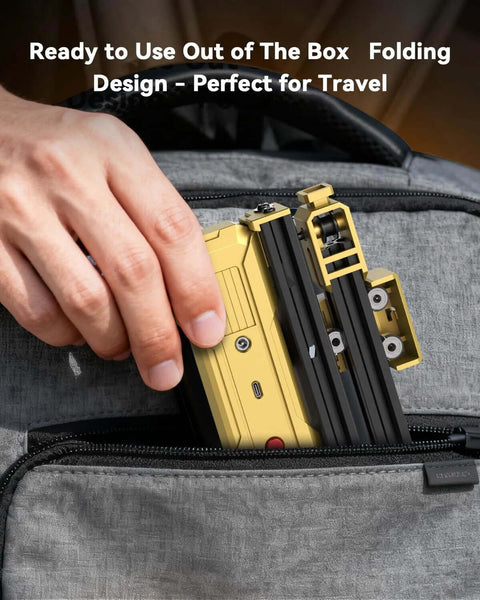 Front view of Artilume T1 foldable laser engraver, yellow portable handheld device being placed into a backpack