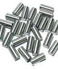 Top Grade 25 Pack Of 6Mm X 12Mm 304 Stainless Steel Dowel Pins and Precision Metal Shelf Pegs clustered together.