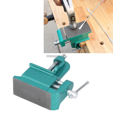 Heavy Duty Iron Bench Vise With Wide Jaw Clamps For Rock Solid Woodworking And Metalworking Holddown Tool in use with hammer.