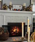 Battery Operated Flameless Taper Candles With Remote And Timer, Realistic 3D Flickering Flame on a cozy fireplace mantel scene