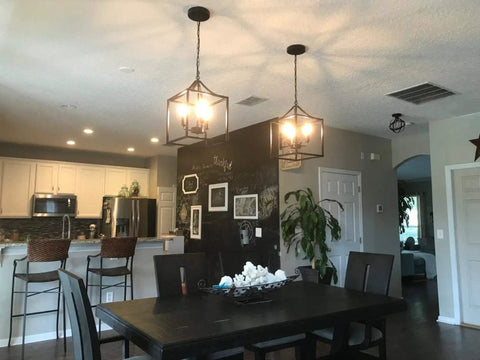 Dope Three Light Industrial Farmhouse Chandelier In Matte Black With Square Cage Pendant above dining table in kitchen