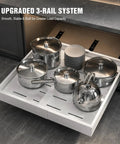 4 Pack White Pull Out Cabinet Organizers 21 Inch Deep Adjustable Width Zero Hassle Drill Free Setup Heavy Duty Tri Rail Sliders Smooth Glide Roll Out Shelves Universal Raised Base For Total Kitchen Storage with pots and plates in a smooth glide organizer.