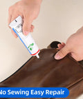 Hands applying Heavy Duty Leather Glue For Permanent Clear Bonding Of Leather Goods Like Sofas Car Seats Purses Boots And More Waterproof Adhesive That Actually Sticks Like A Champ On Cowhide Suede Canvas And Rubber 2 Oz to a brown leather bag