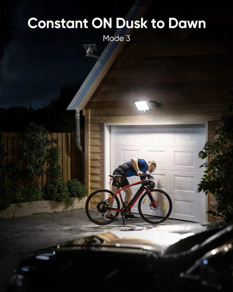 Solar Security Light With Motion Sensor 1000 Lumen 48 LED IP65 Waterproof Outdoor Floodlight illuminating garage at night