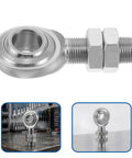 3/4 Inch Steel Heim Joint Rod End With Two Nuts And Right Hand Thread For Quick Installation on a workbench.