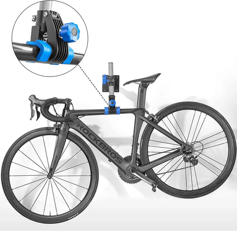 Wall Mounted Bike Repair Stand With Height Adjustable Clamp And Workbench Mount For Road And Mountain Bikes DIY Friendly Home Bicycle Maintenance Rack For Quick Repairs attached to a black road bike.