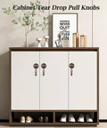 4Pcs Vintage Tear Drop Cabinet Pulls With Screws, Red Bronze Zinc Alloy Handles For Dresser, Closet And Furniture, 2.6 Inch (65mm) Drop Knob Set, shown installed on white cabinet doors.