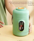 Compact 500W Mini Electric Pot With Portable Stainless Steel Ramen Cooker 6-In-1 Functions And 12-Hour Timer in green on table