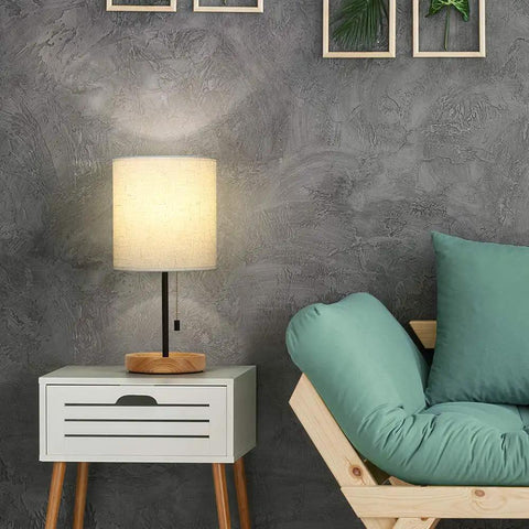 Modern Wood Base Table Lamp With Linen Shade For Nightstand And Desk Bedside Light For Living Room Bedroom Office Or Dorm Soft Non Flicker Glow That Eases Eyes And Creates A Cozy Vibe on a nightstand next to sofa
