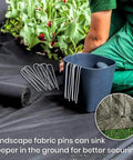 100 Pack 6 Inch Garden Stakes Galvanized Landscape Staples for Weed Barrier Fabric Heavy Duty Sod Pins shown in use