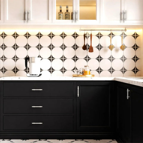 10 Pack 3 Inch (76mm) Brushed Satin Nickel Cabinet Pulls for Kitchen Cabinets on black drawers and white cabinets.