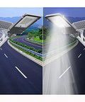 Heavy Duty Outdoor Solar Wall Light With Dusk To Dawn Sensor And Hella Bright Waterproof Led Security Flood Light Featuring A Wireless Remote Control For Driveway Use mounted on a streetlight showing illuminated path.