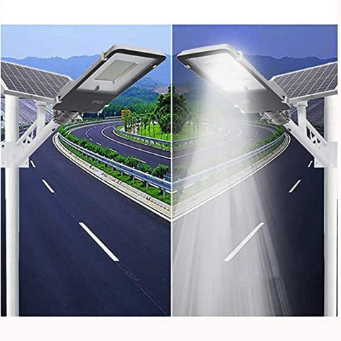 Heavy Duty Outdoor Solar Wall Light With Dusk To Dawn Sensor And Hella Bright Waterproof Led Security Flood Light Featuring A Wireless Remote Control For Driveway Use mounted on a streetlight showing illuminated path.